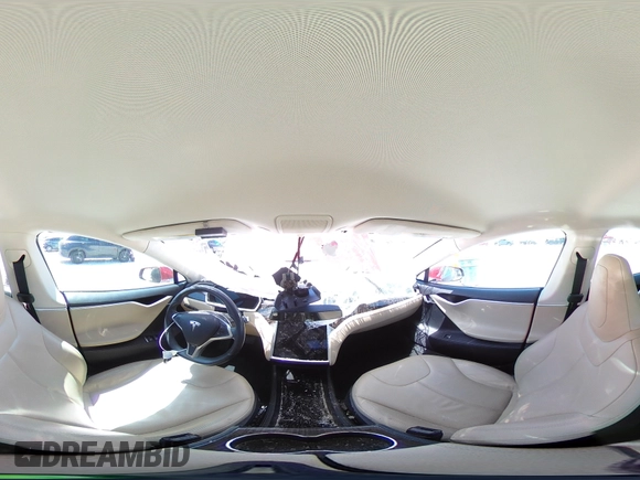2013 Tesla Model S with VIN 5YJSA1CN1DFP26864, listed as a Copart auction lot 52029485 with 63,260 mi miles and Salvage Title. Bid and sale history available at DreamBid. Image 12.