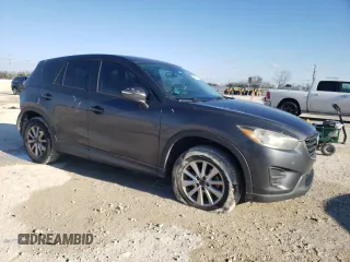 2016 Mazda CX-5 Sport with VIN JM3KE2BE9G0650543, listed as a Copart auction lot 41987795 with 163,528 mi miles and Salvage Title. Bid and sale history available at carsss.com. Image 4.
