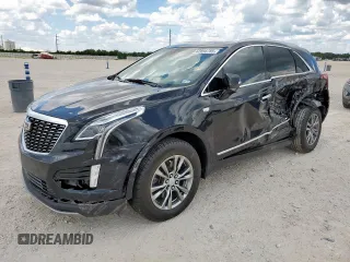 2021 Cadillac XT5 FWD Premium Luxury with VIN 1GYKNCRS0MZ100515, listed as a Copart auction lot 62856785 with 50,298 mi miles and Salvage title. Bid and sale history available at DreamBid. Image 1.