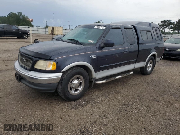 2000 Ford F-150 XL with VIN 1FTRX17L7YNC24292, listed as a Copart auction lot 58852925 with 213,318 mi miles and Salvage title. Bid and sale history available at DreamBid. Image 1.