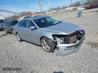 2013 Volkswagen Passat SEL Premium with VIN 1VWCM7A37DC024252, listed as a IAAI auction lot 41944978 with 168,616 mi miles. Bid and sale history available at carsss.com. Image 1.