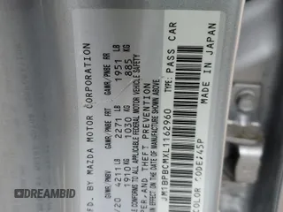 2020 Mazda 3 S Carbon Edition z VIN JM1BPBCMXL1162960, wystawiony jako Copart lot #57603795 z przebiegiem 31 229 mil mil oraz Szkoda całkowita • Salvage title. Historia ofert i sprzedaży dostępna na DreamBid. Obrazek 12.