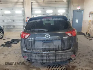 2015 Mazda CX-5 Touring with VIN JM3KE2CY2F0458114, listed as a IAAI auction lot 41545493 with 138,061 mi miles. Bid and sale history available at carsss.com. Image 17.