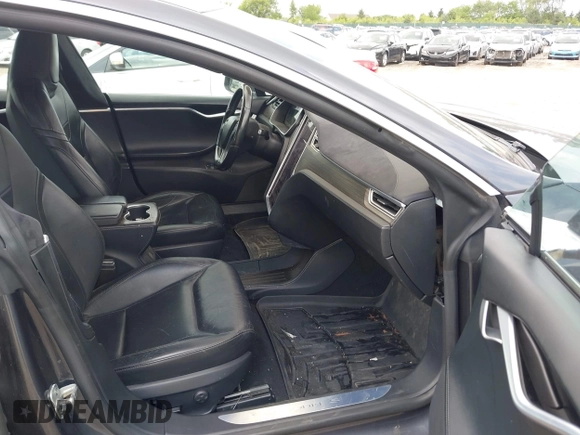 2016 Tesla Model S 90D with VIN 5YJSA1E25GF129482, listed as a IAAI auction lot 42588913 with 101,790 mi miles and . Bid and sale history available at DreamBid. Image 5.