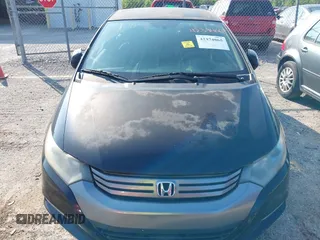2010 Honda Insight EX z VIN JHMZE2H74AS008452, wystawiony jako IAAI lot #42374065 z przebiegiem 228 476 mil mil oraz . Historia ofert i sprzedaży dostępna na DreamBid. Obrazek 6.
