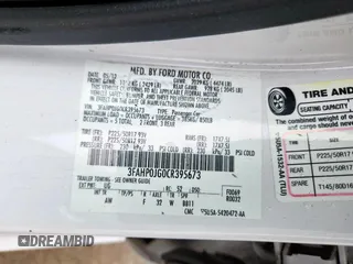 2012 Ford Fusion SEL with VIN 3FAHP0JG0CR395673, listed as a Copart auction lot 57904135 with 169,886 mi miles and Salvage title. Bid and sale history available at DreamBid. Image 13.