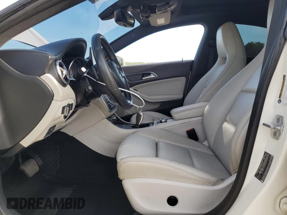 2016 Mercedes-Benz CLA 250 with VIN WDDSJ4GBXGN389799, listed as a Copart auction lot 65928045 with 81,548 mi miles and Salvage title. Bid and sale history available at DreamBid. Image 7.