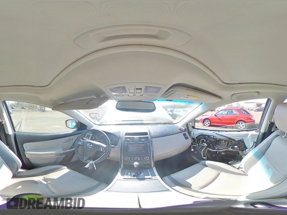 2010 Mazda CX-9 Grand Touring z VIN JM3TB3MV4A0215694, wystawiony jako Copart lot #54254805 z przebiegiem 168 263 mil mil oraz Szkoda całkowita • Salvage title. Historia ofert i sprzedaży dostępna na DreamBid. Obrazek 16.