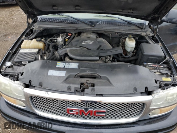 2003 GMC Yukon Denali z VIN 1GKEK63U43J263449, wystawiony jako Copart lot #53848345 z przebiegiem 144 280 mil mil oraz Szkody całkowita. Historia ofert i sprzedaży dostępna na DreamBid. Obrazek 12.