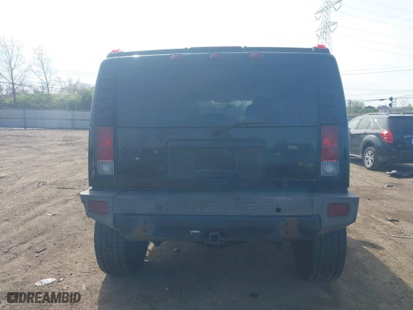 2005 Hummer H2 SUV with VIN 5GRGN23U05H128420, listed as a IAAI auction lot 41983395 with 194,925 mi miles. Bid and sale history available at carsss.com. Image 17.