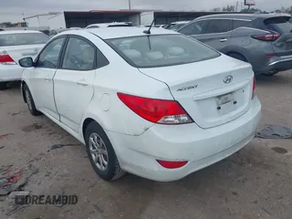 2013 Hyundai Accent GLS with VIN KMHCT4AE3DU325550, listed as a IAAI auction lot 41185651 with 128,791 mi miles and . Bid and sale history available at DreamBid. Image 3.