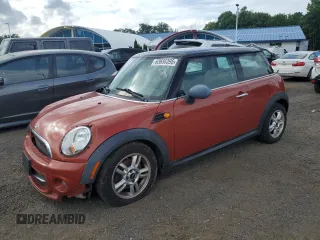 2012 MINI Hardtop z VIN WMWSU3C53CT260060, wystawiony jako Copart lot #63656395 z przebiegiem 100 537 mil mil oraz Czysty tytuł • Clean title. Historia ofert i sprzedaży dostępna na DreamBid. Obrazek 1.