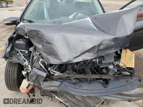 2015 Ford Fiesta SE z VIN 3FADP4BJ8FM150587, wystawiony jako Copart lot #57878275 z przebiegiem Nie podano mil oraz Szkoda całkowita • Salvage title. Historia ofert i sprzedaży dostępna na DreamBid. Obrazek 11.