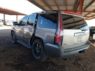 2007 GMC Yukon SLT with VIN 1GKFC13J87R216779, listed as a IAAI auction lot 41472867 with 200,754 mi miles. Bid and sale history available at carsss.com. Image 3.