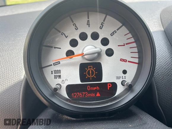 2012 MINI Countryman S с VIN WMWZC5C58CWL60215, выставлен на аукционе Copart как лот 63710935 с пробегом 127 673 миль миль и Чистый • Clean title. История ставок и продаж доступна на DreamBid. Изображение 8.