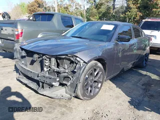 2020 Dodge Charger SXT with VIN 2C3CDXBG7LH101173, listed as a IAAI auction lot 41844489 with 157,773 mi miles. Bid and sale history available at carsss.com. Image 2.