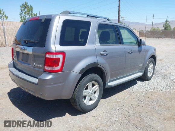 2008 Ford Escape Hybrid with VIN 1FMCU59H28KB77877, listed as a IAAI auction lot 42538747 with 305,353 mi miles and . Bid and sale history available at DreamBid. Image 4.