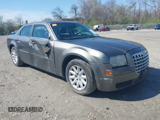2008 Chrysler 300 LX with VIN 2C3KA43R18H122398, listed as a IAAI auction lot 41960956 with 240,960 mi miles. Bid and sale history available at carsss.com. Image 1.