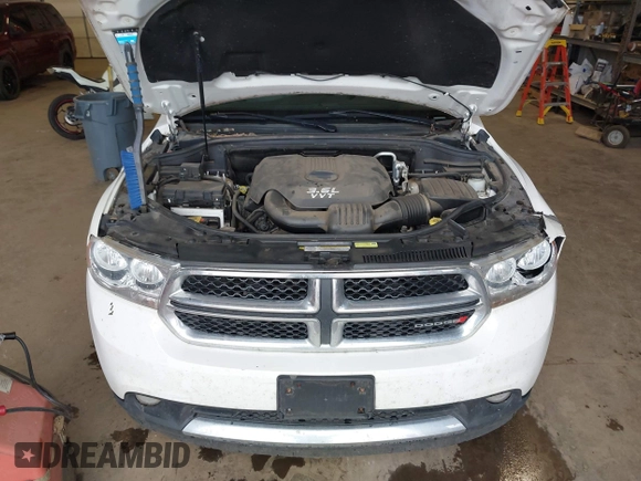 2012 Dodge Durango SXT with VIN 1C4RDJAGXCC295138, listed as a IAAI auction lot 42333094 with 96,581 mi miles and . Bid and sale history available at DreamBid. Image 10.