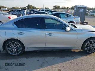 2017 Infiniti Q50 Premium with VIN JN1CV7AR6HM681017, listed as a IAAI auction lot 41212271 with 141,479 mi miles and . Bid and sale history available at carsss.com. Image 13.