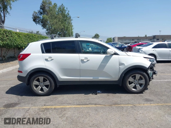 2013 Kia Sportage LX with VIN KNDPB3A23D7514304, listed as a IAAI auction lot 42544397 with 82,456 mi miles and . Bid and sale history available at DreamBid. Image 14.