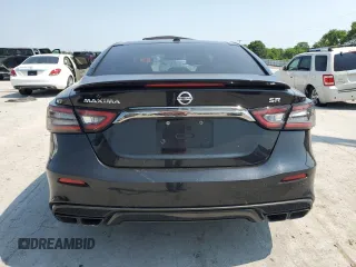 2019 Nissan Maxima SL z VIN 1N4AA6AV4KC374004, wystawiony jako Copart lot #59186745 z przebiegiem 121 571 mil mil oraz Szkoda całkowita • Salvage title. Historia ofert i sprzedaży dostępna na DreamBid. Obrazek 6.