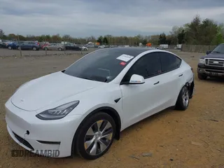 2021 Tesla Model Y Long Range with VIN 5YJYGDEE6MF122363, listed as a IAAI auction lot 41952018 with 54,263 mi miles and . Bid and sale history available at carsss.com. Image 2.