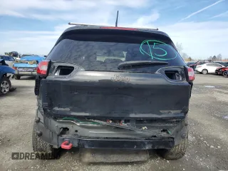 2014 Jeep Cherokee Trailhawk with VIN 1C4PJMBS9EW159993, listed as a Copart auction lot 46935105 with 128,140 mi miles and Salvage Title. Bid and sale history available at carsss.com. Image 6.