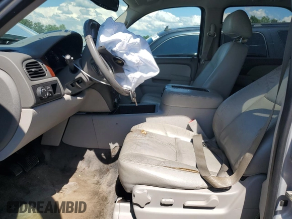 2014 Chevrolet Tahoe LT with VIN 1GNSCBE0XER117275, listed as a Copart auction lot 55858125 with 163,061 mi miles and Salvage title. Bid and sale history available at DreamBid. Image 7.