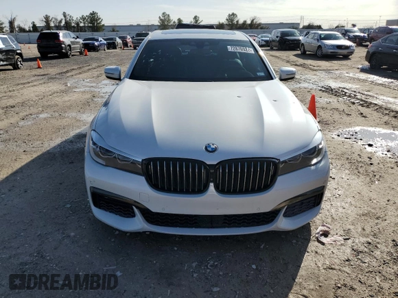 2016 BMW 7 Series 740i with VIN WBA7E2C58GG548314, listed as a Copart auction lot 72876922 with 74,981 mi miles. Bid and sale history available at carsss.com. Image 5.