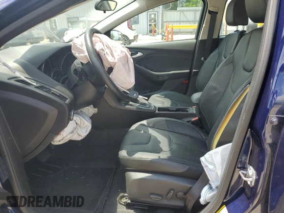 2016 Ford Focus SE z VIN 1FADP3F23GL288232, wystawiony jako Copart lot #62565095 z przebiegiem 11 634 mil mil oraz Szkoda całkowita • Salvage title. Historia ofert i sprzedaży dostępna na DreamBid. Obrazek 7.