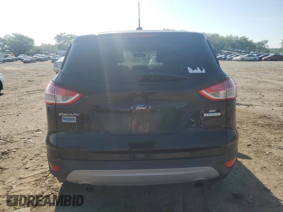 2013 Ford Escape SE with VIN 1FMCU0GX1DUB91314, listed as a Copart auction lot 56740905 with 94,861 mi miles and Clean Title. Bid and sale history available at DreamBid. Image 6.