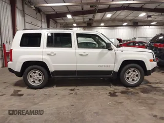 2014 Jeep Patriot Sport with VIN 1C4NJPBA6ED563281, listed as a IAAI auction lot 42392464 with 144,880 mi miles and . Bid and sale history available at DreamBid. Image 14.