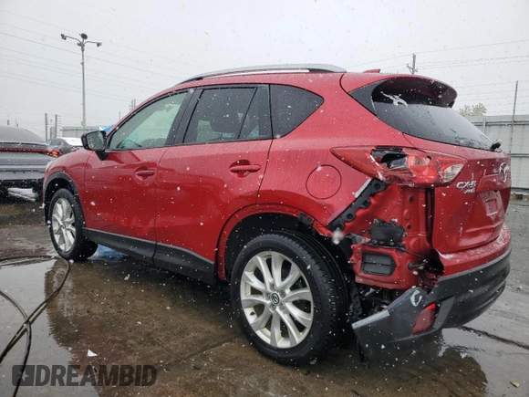 2014 Mazda CX-5 Grand Touring with VIN JM3KE4DY6E0309925, listed as a Copart auction lot 53521105 with 161,579 mi miles and Salvage Title. Bid and sale history available at carsss.com. Image 2.