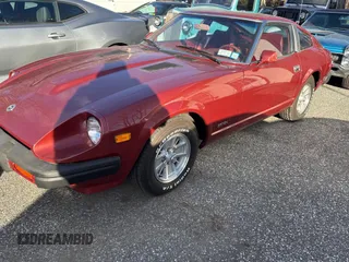1980 Datsun 280ZX z VIN HS130198111, wystawiony jako Copart lot #84153084 z przebiegiem 106 400 mil mil oraz Tytuł czysty. Historia ofert i sprzedaży dostępna na DreamBid. Obrazek 2.