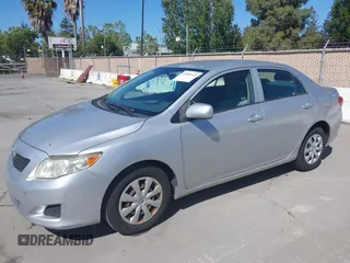 2009 Toyota Corolla with VIN JTDBL40E899057154, listed as a IAAI auction lot 42200165 with 200,545 mi miles and . Bid and sale history available at carsss.com. Image 2.