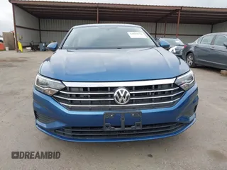 2020 Volkswagen Jetta S z VIN 3VWC57BU2LM086126, wystawiony jako IAAI lot #42054196 z przebiegiem 29 819 mil mil oraz . Historia ofert i sprzedaży dostępna na DreamBid. Obrazek 13.