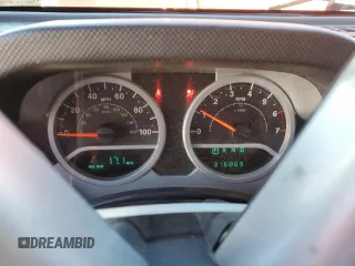 2008 Jeep Wrangler Sahara with VIN 1J4FA54168L583783, listed as a Copart auction lot 50415545 with 316,869 mi miles and Salvage title. Bid and sale history available at DreamBid. Image 9.