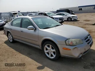 2002 Nissan Maxima GLE z VIN JN1DA31A62T000726, wystawiony jako Copart lot #71235864 z przebiegiem 219 647 mil mil oraz Szkoda całkowita • Salvage title. Historia ofert i sprzedaży dostępna na DreamBid. Obrazek 4.