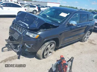 2015 Jeep Grand Cherokee High Altitude with VIN 1C4RJFCG5FC807394, listed as a IAAI auction lot 42452034 with 72,011 mi miles and . Bid and sale history available at DreamBid. Image 18.