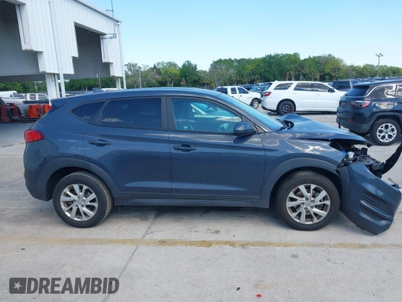 2021 Hyundai Tucson SE with VIN KM8J23A48MU379826, listed as a IAAI auction lot 41887834 with 51,885 mi miles and . Bid and sale history available at DreamBid. Image 14.