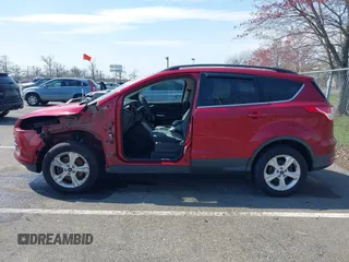 2016 Ford Escape SE with VIN 1FMCU9G99GUA89298, listed as a IAAI auction lot 42013116 with 192,408 mi miles. Bid and sale history available at carsss.com. Image 14.