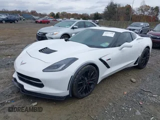 2014 Chevrolet Corvette 1LT z VIN 1G1YA2D7XE5128719, wystawiony jako IAAI lot #40877448 z przebiegiem 75 961 mil mil oraz . Historia ofert i sprzedaży dostępna na DreamBid. Obrazek 2.