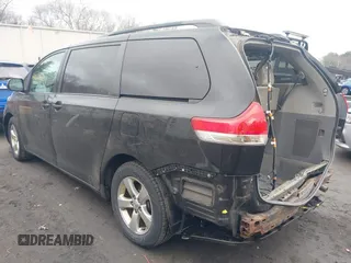 2013 Toyota Sienna LE AAS with VIN 5TDKK3DCXDS365748, listed as a IAAI auction lot 41672203 with 175,563 mi miles. Bid and sale history available at carsss.com. Image 3.
