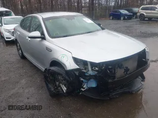 2019 Kia Optima LX with VIN 5XXGT4L31KG348622, listed as a IAAI auction lot 41726487 with 100,286 mi miles. Bid and sale history available at carsss.com. Image 1.