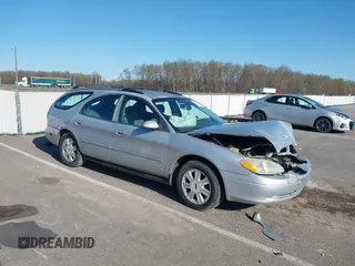 2003 Ford Taurus z VIN 1FAHP59U83A234246, wystawiony jako IAAI lot #41975597 z przebiegiem 178 869 mil mil oraz . Historia ofert i sprzedaży dostępna na DreamBid. Obrazek 1.