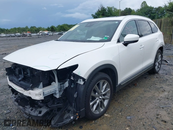2019 Mazda CX-9 Signature with VIN JM3TCBEY6K0307102, listed as a IAAI auction lot 42645716 with 55,299 mi miles and . Bid and sale history available at DreamBid. Image 2.