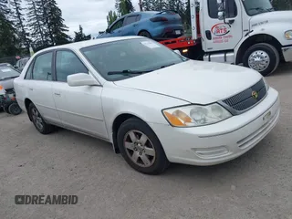 2002 Toyota Avalon XL with VIN 4T1BF28B82U239876, listed as a IAAI auction lot 42142686 with 104,163 mi miles. Bid and sale history available at carsss.com. Image 1.