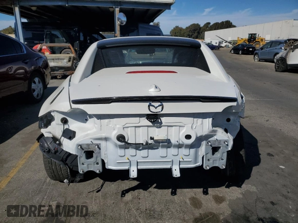 2024 Mazda MX-5 Miata Grand Touring z VIN JM1NDAM76R0602972, wystawiony jako Copart lot #77665904 z przebiegiem 4 965 mil mil oraz Szkoda całkowita • Salvage title. Historia ofert i sprzedaży dostępna na DreamBid. Obrazek 6.