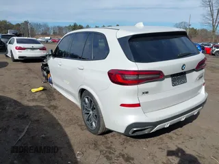 2020 BMW X5 M50i with VIN 5UXJU4C06LLE45651, listed as a IAAI auction lot 41618355 with 70,885 mi miles and . Bid and sale history available at DreamBid. Image 3.